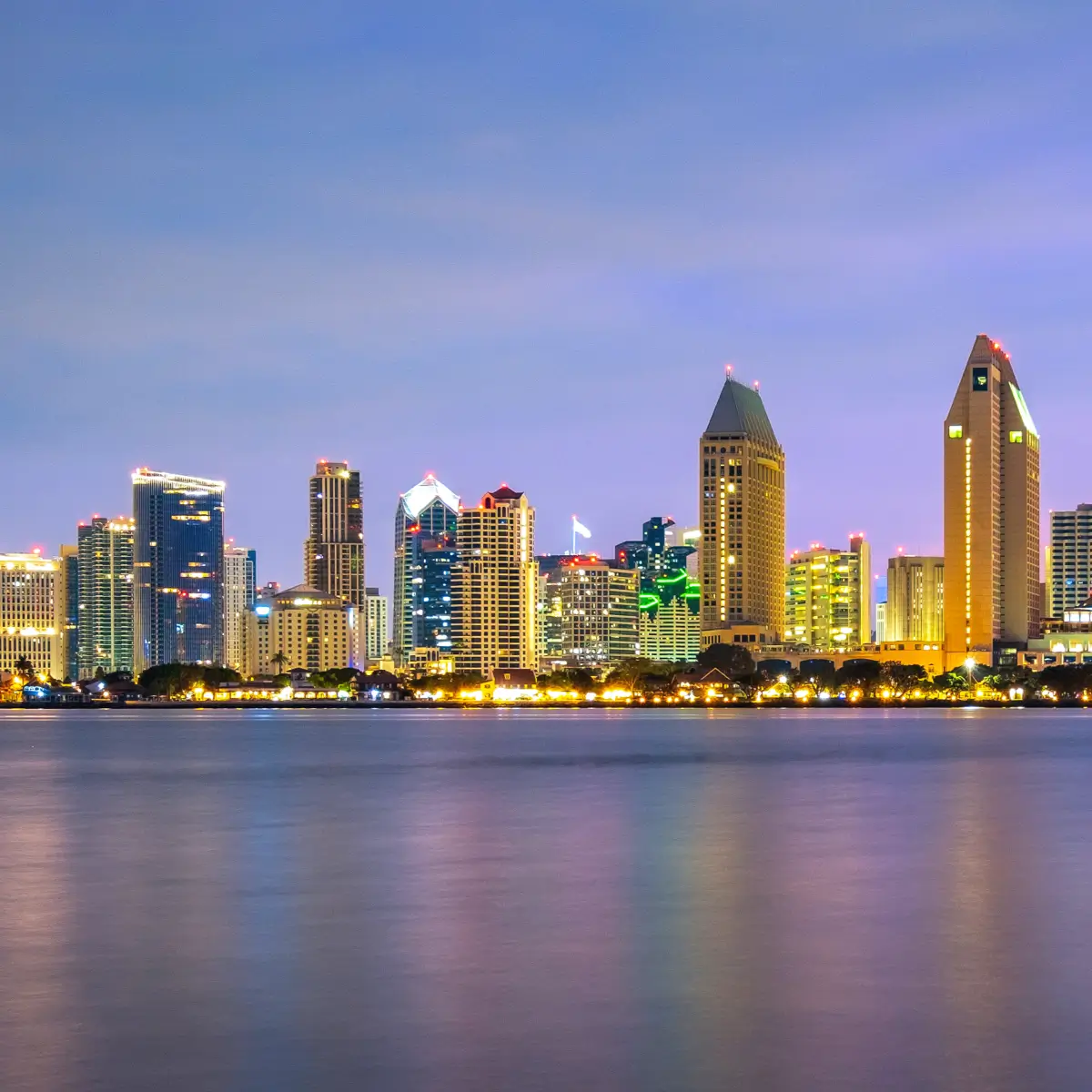 Nighttime view of San Diego skyline from Coronado island. 