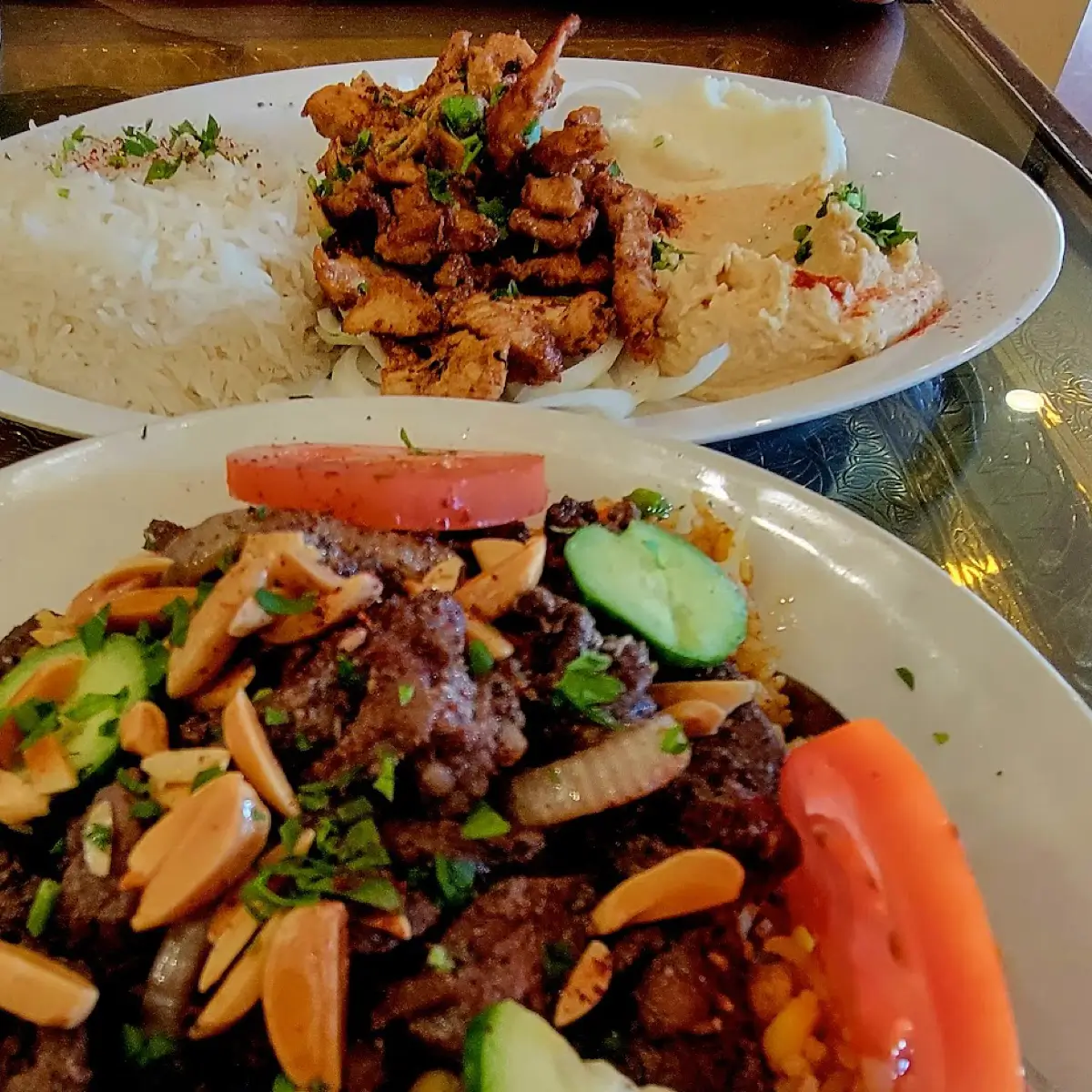A beef and a chicken dish with rice at Aladdin Hillcrest.