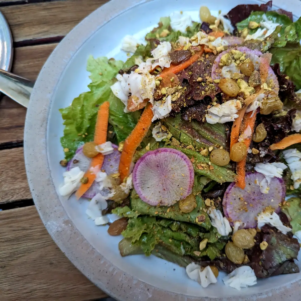 A fresh salad with golden raisins from Donna Jean.