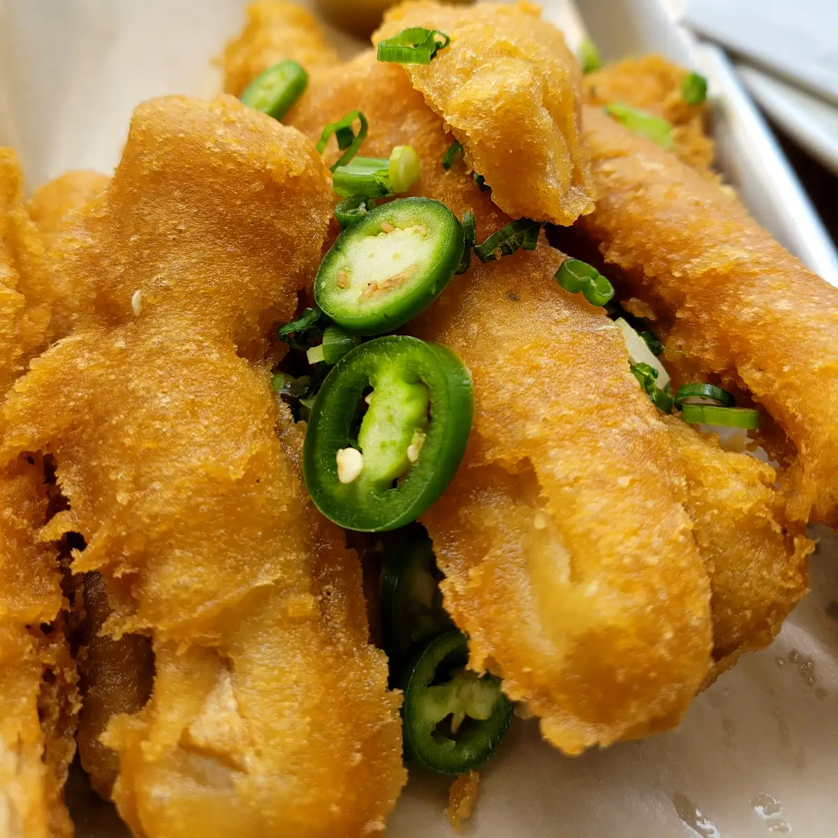 Fried dish with jalapeños from Grains. 