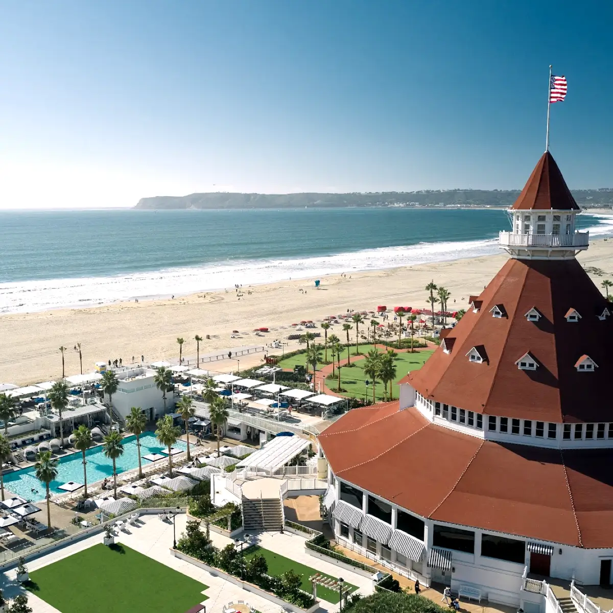 A bird's eye view of the Hotel del Coronado with iconic red roof. 