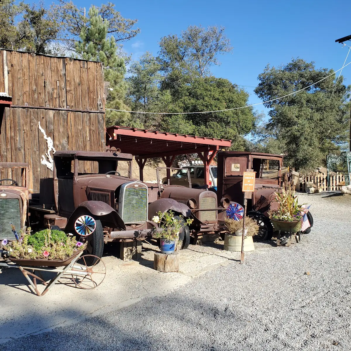 View of antique cars on the road to Julian, California.  