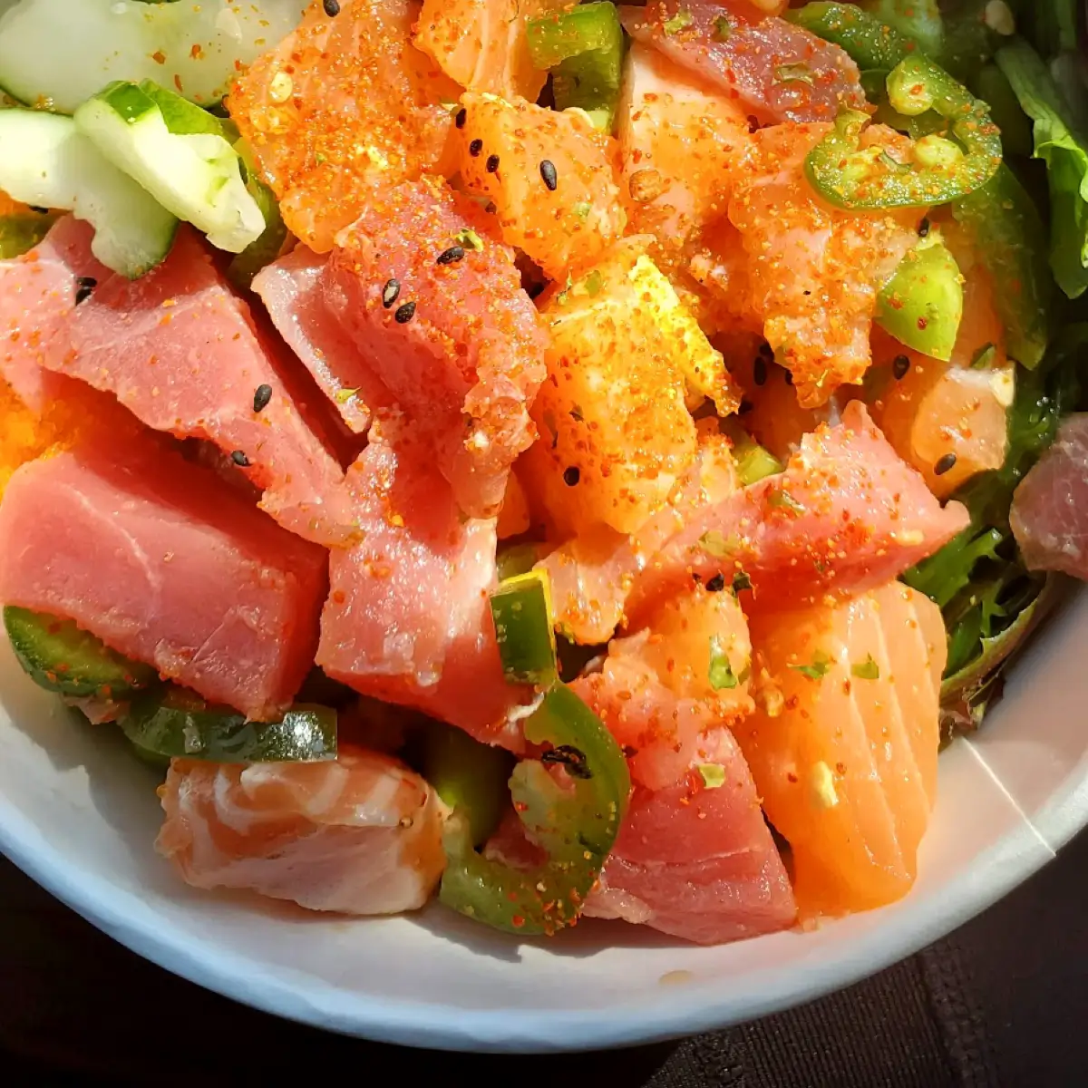 A fresh salmon and tuna poke bowl at the Poke Chop.