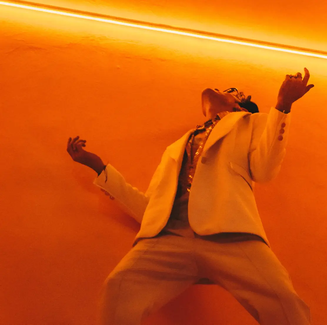 Artistic photo of an LGBTQ+ man dancing 