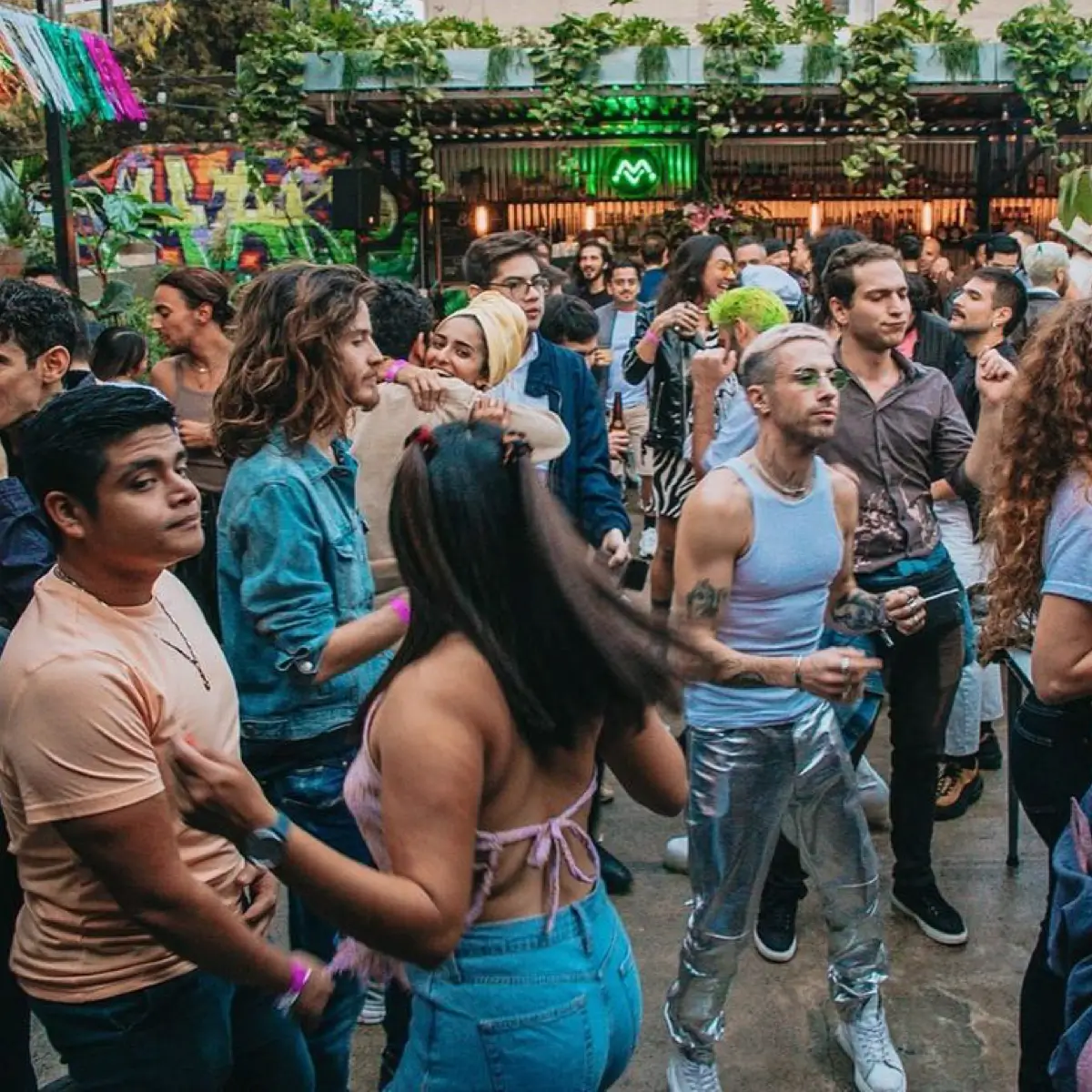LGBTQ+ people day drinking at an outside bar
